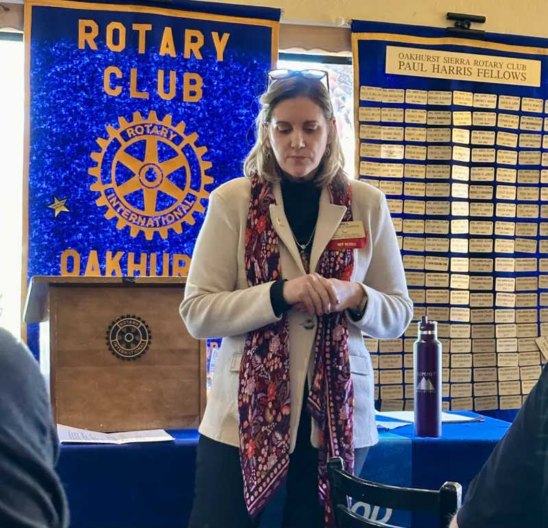 Mel Barker speaking at a Rotary Club meeting